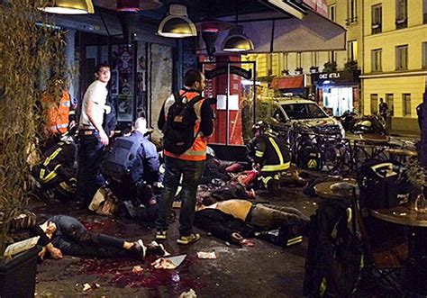 The Latest: At least 120 confirmed killed in Paris terror attacks