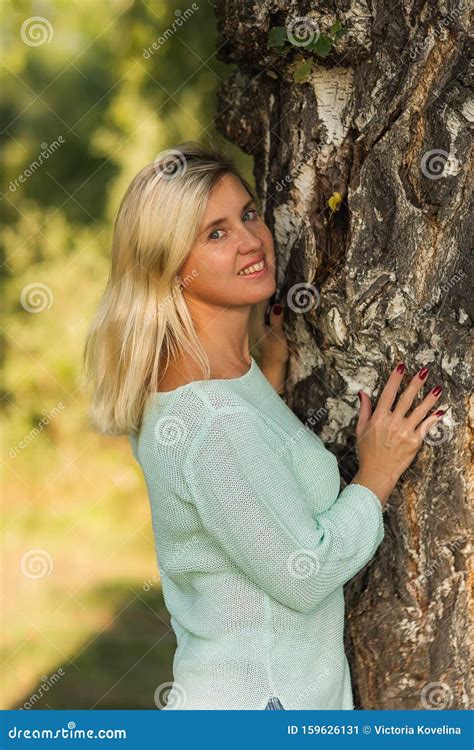 portrait of beautiful blond 40 year old woman stock image image of grass adult 159626131