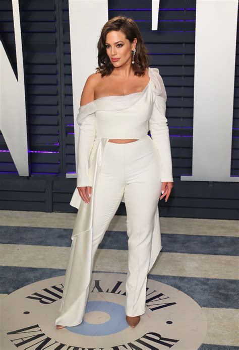 ashley graham s oscars afterparty outfit is steamier than the kiss with her husband on the red