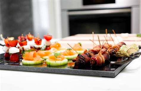 Caprese Salad Bites Smoked Salmon Cucumber Disks And Bacon Wrapped