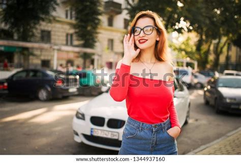 photo de stock attractive redhaired woman eyeglasses wear on 1344937160 shutterstock