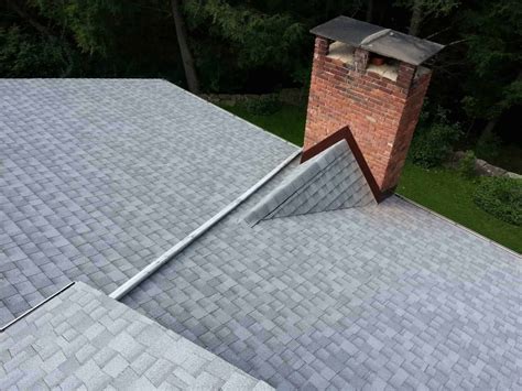 Gray metal roof epdm round pipe stove chimney flashing. chimney-flashing-20130912_111114 | Gonzales Roofing Inc ...