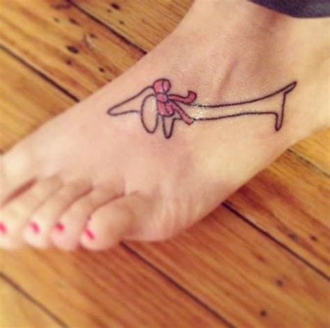 the 23 coolest dachshund tattoo designs in the world dachshund tattoo pawprint tattoo