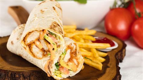 Massage the oil and jerk seasoning into the chicken. Jumbo Chicken Wrap (Salad included) - Hassan Catering Takeout