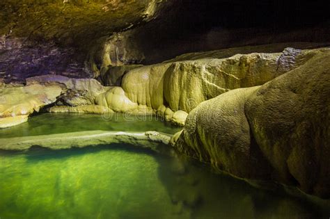 Natural Speleothem Cascades Of Lakes And Waterfalls In