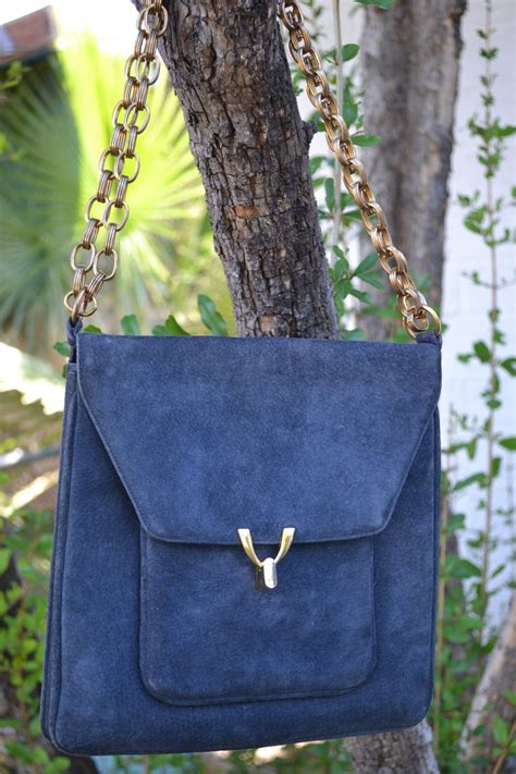 An elegant navy blue belt, add a buckle of your choice and you're all set to create a classic. Vintage 1960s Prestige Shoulder Bag Navy Blue Suede ...