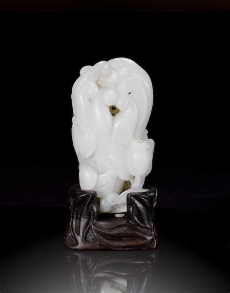 Bonhams A Mottled White Jade Carving Of A Finger Citron