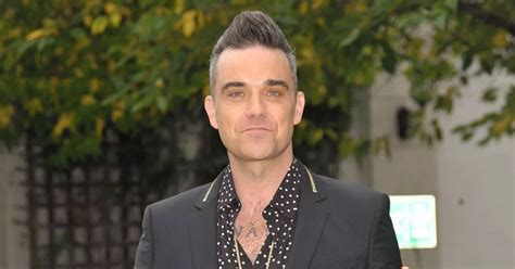 Robbie Williams Poses Completely Naked As He Strips Off For X Rated