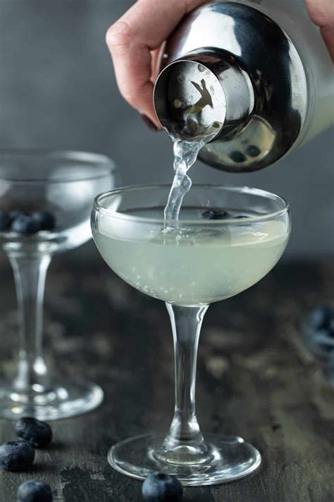 Easy Blueberry Martini With Elderflower Liqueur Garnish With Lemon