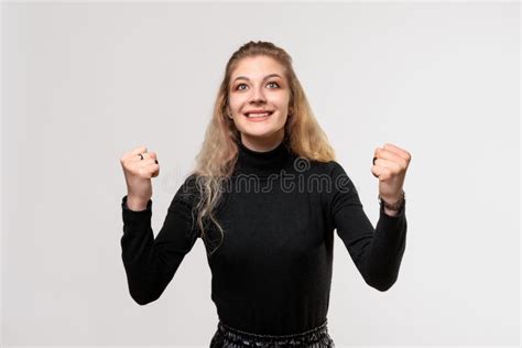 Blonde Girl Laughing And Feeling Happy And Excited While Celebrating Success Stock Image Image
