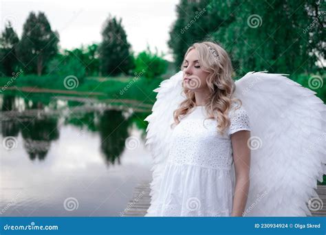 Woman With White Angel Wings Beautiful Blonde In Angel Costume Heaven