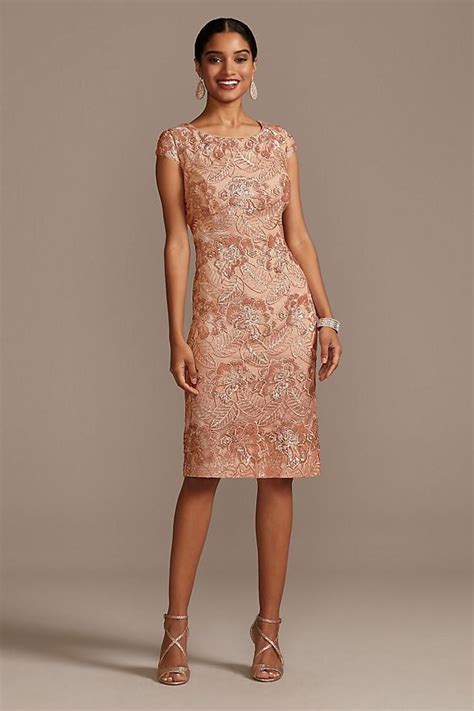 Lace sleeves (opposed to solid silk) add a textural element to a wedding dress. Alex Evenings Sequin Lace Knee-Length Sheath with Cap ...