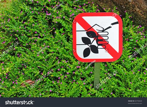 Sign In The Garden Cautioning Not To Pluck Flowers And Leaves Stock