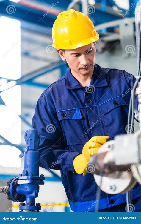 Technician In Factory At Machine Maintenance Stock Image Image Of