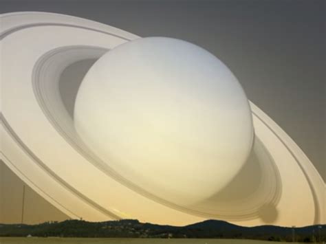 Heres What It Would Look Like If Saturn Flew Past Earth Closer Than