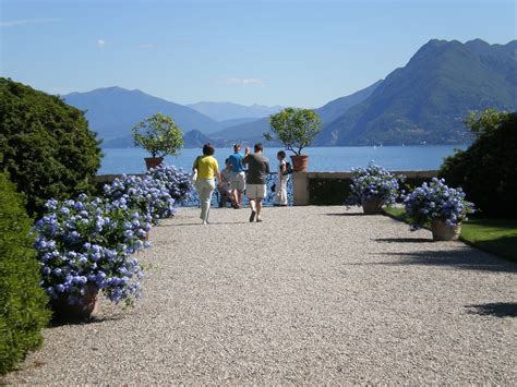 Beach hotels lake maggiore toes in the sand, drink in hand, skin getting tanned—beach life is the sweet life. Lake Maggiore, Northern Italy | Northern italy, Favorite ...