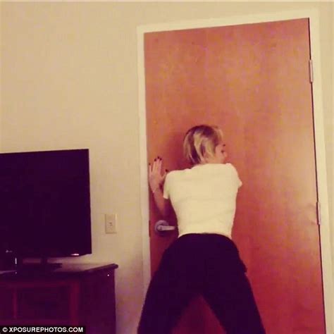 miley cyrus shows off some her best moves as she gyrates around door daily mail online