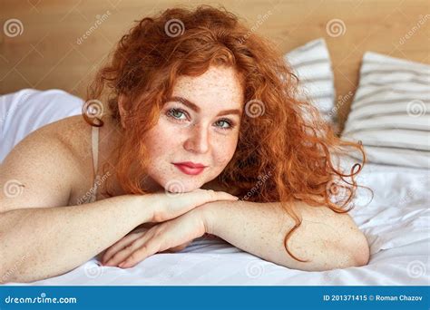 Smiling Red Haired Female Enjoy Weekends Lying On Bed Stock Image Image Of Adult Overweight