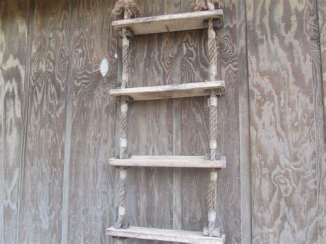 Decorative wall mounts for rope shelves. Vintage ladder, rope ladder, wall shelf, boat ladder, display shelf, wall decor, wall hanging ...