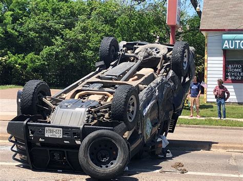 Game warden truck rolls in Waco Dr crash