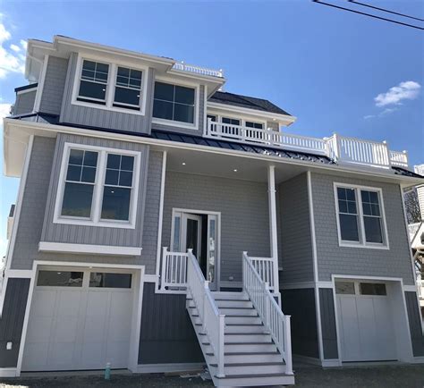 Many of these homes include elevators for easy access to upper floors. NEW CONSTRUCTION REVERSE LIVING BEACH HOUSE | New Jersey ...