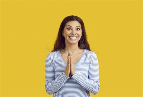 Happy Excited Woman Waiting For Surprise Smiling And Rubbing Hands In