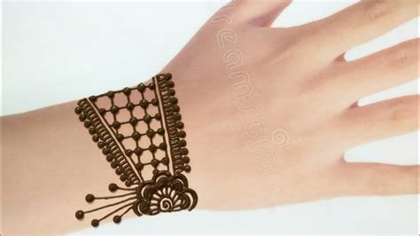Beautiful traditional gol tikki mehndi design|how to apply. Jewellery style back hand mehndi design | Gol tikki mehndi ...