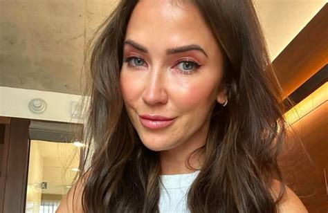 kaitlyn bristowe shows off spray tan lines in 2 vibrant swimsuits stunning