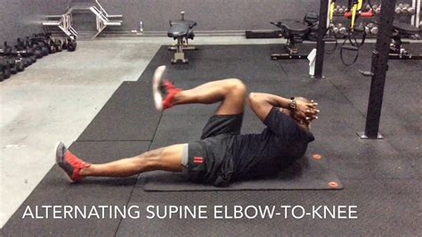 Alternating Supine Elbow To Knee Youtube