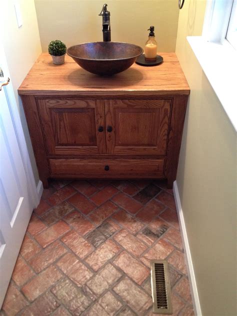 Sealing your ceramic tile floor with a long lasting clear gloss tile sealer that will rejuvenate and you want to know why some tile sealers for ceramic and porcelain tile are better than others? Wright's Ferry brick tile powder room floor, Marietta ...