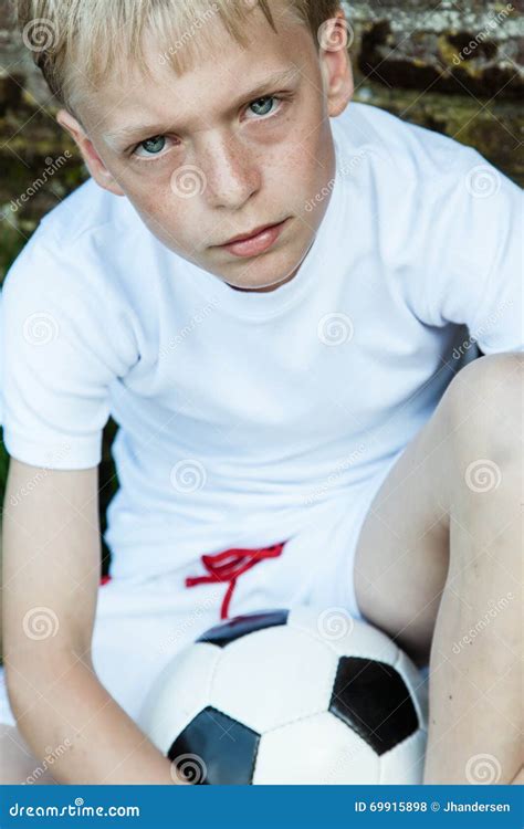 Close Up Of Blond And Blue Eyed Boy With Ball Stock Photo Image Of