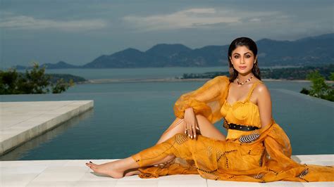 Brunette Bollywood Girl Indian Actress Shilpa Shetty With Yellow Dress In Background Of Sea
