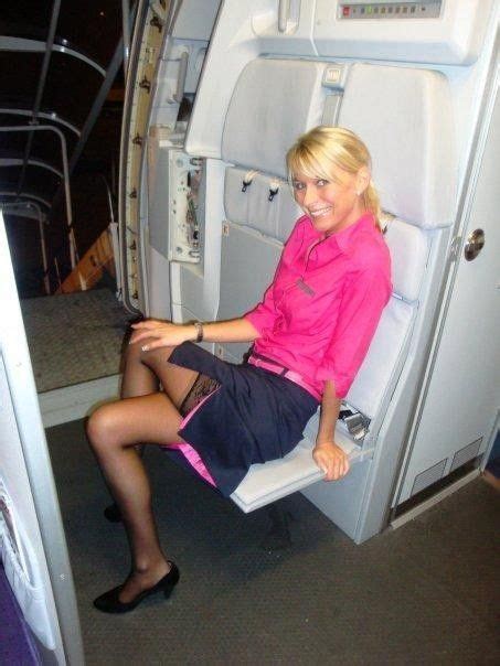 Airhostess Shows Stocking Tops Pretty Hot You Have To Admit Flight Attendant Hot Flight