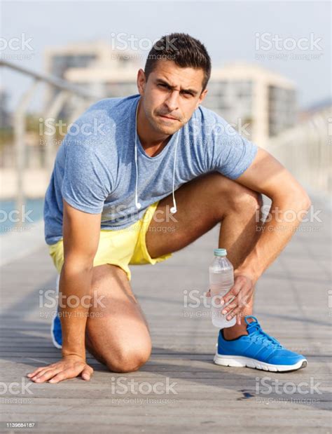 Man Drinking Water During Workout Stock Photo Download Image Now