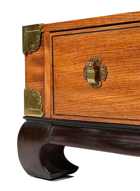Crafted from cherry veneer and poplar wood solids* inspired by furniture styles from the ming dynasty Chinoiserie Asian Inspired Bassett Coffee Table with Brass ...