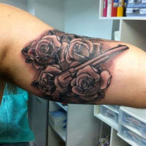 Blue rose tattoo design on ankle. 20 best Guns And Roses Tattoos For Men images on Pinterest ...