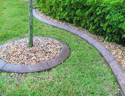 Brick edging on a lawn helps keep edges intact, minimising labour and adding a crisp finish. Landscape edging around your garden or flower bed with concrete | E & J Concrete and Dirt Work