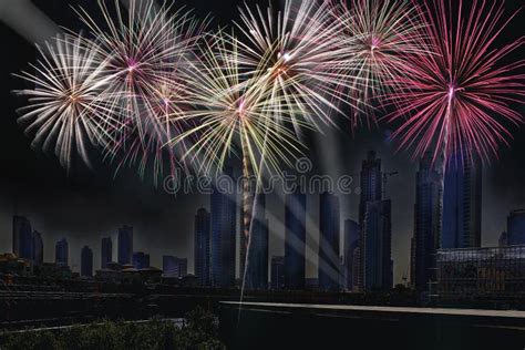 Fantastic Festive New Years Colorful Fireworks On Cityscape Down Stock