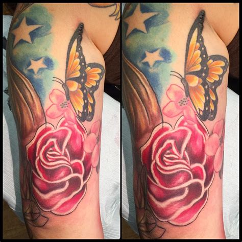 Https://tommynaija.com/tattoo/butterfly On A Flower Tattoo Designs