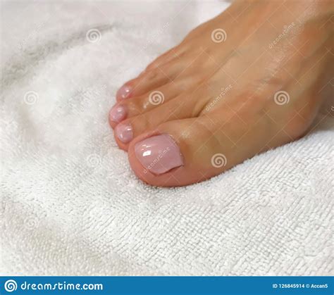 Closeup Photo Of Woman Toes With Pink Nail Polish Stock Photo Image