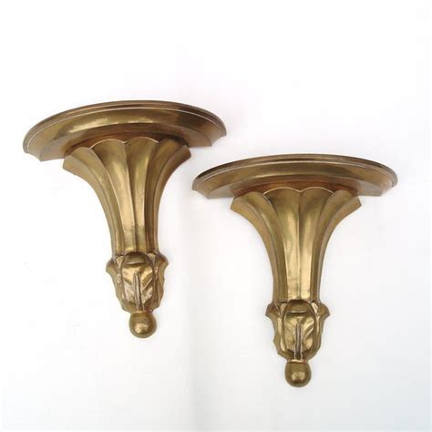 But what if you want to hang a shelf in a spot with no stud? Vintage Brass Floating Wall Shelves - A Pair | Chairish