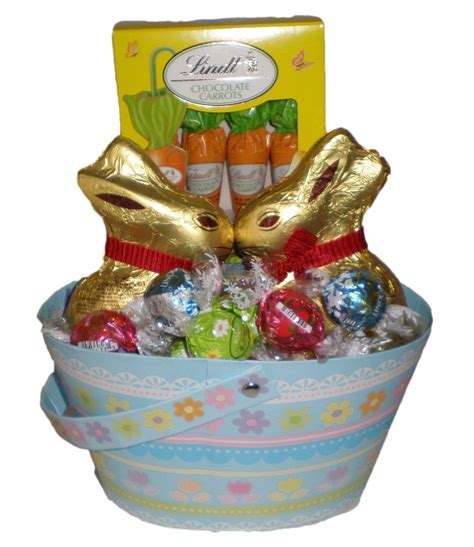 Pralinés, tafeln, crème, sticks uvm. Happy Easter! Lindt Chocolate Truffles, Bunny,and Carrots ...