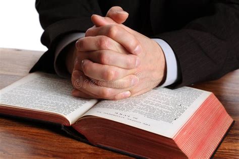 Praying Hands On An Open Bible Stock Image Image Of Book Priest