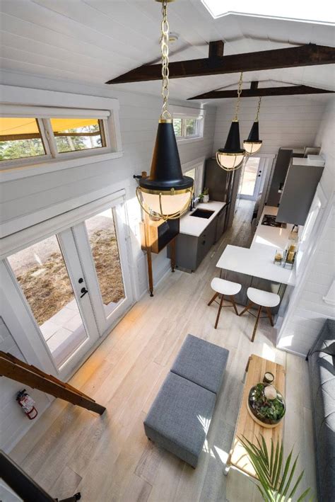 The innsbruck tiny house features a downstairs bedroom and a big shower. 36ft Tiny Home with Dual Slide Outs, Downstairs Bedroom ...