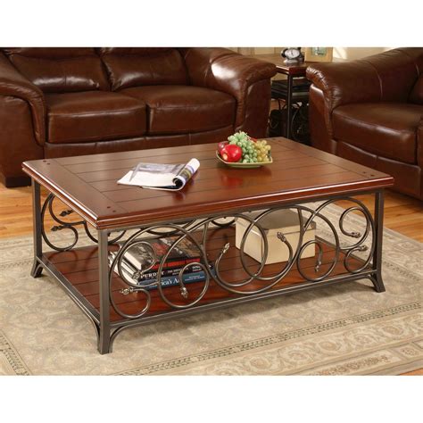 This versatile table can also double as a multipurpose accent piece for displaying your favorite decorative items. Copper Grove Scrolled Metal and Wood Coffee Table ...