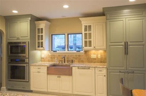 Do you suppose sage green kitchen with oak cabinets appears to be like great? sage green kitchen cream cabinets | Ivory kitchen with sage green accents and copper apron sink ...