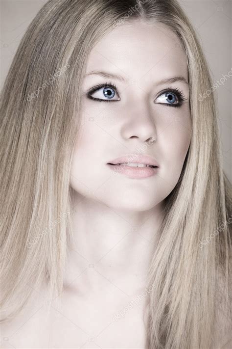 Blond Teenage Girl With Blue Eyes Stock Photo By ©lubavnel 5396360