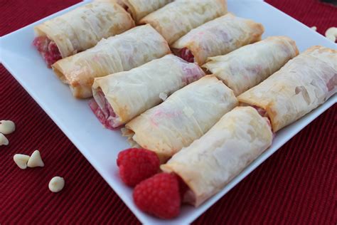 The vinegar helps the dough to become crispy.) White Chocolate Raspberry Phyllo Rolls