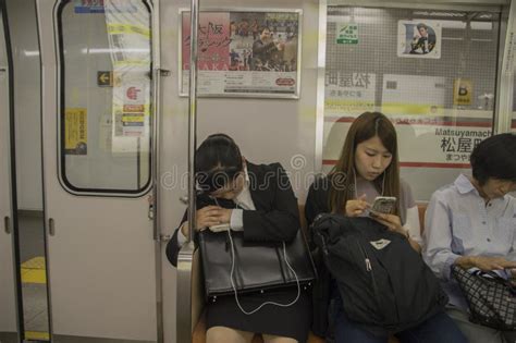 Japanese Woman Sleeping At An Osaka Subway Train At Japan 2016 Editorial Photography Image Of