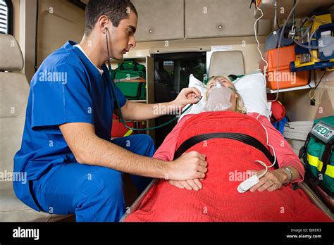 Nurse And Patient In Ambulance Stock Photo Alamy
